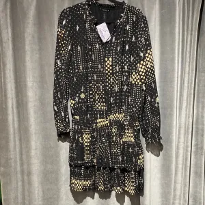 DECKER Black Long Sleeve Dress with Rose Gold Shine, Stars and Dots in Beige