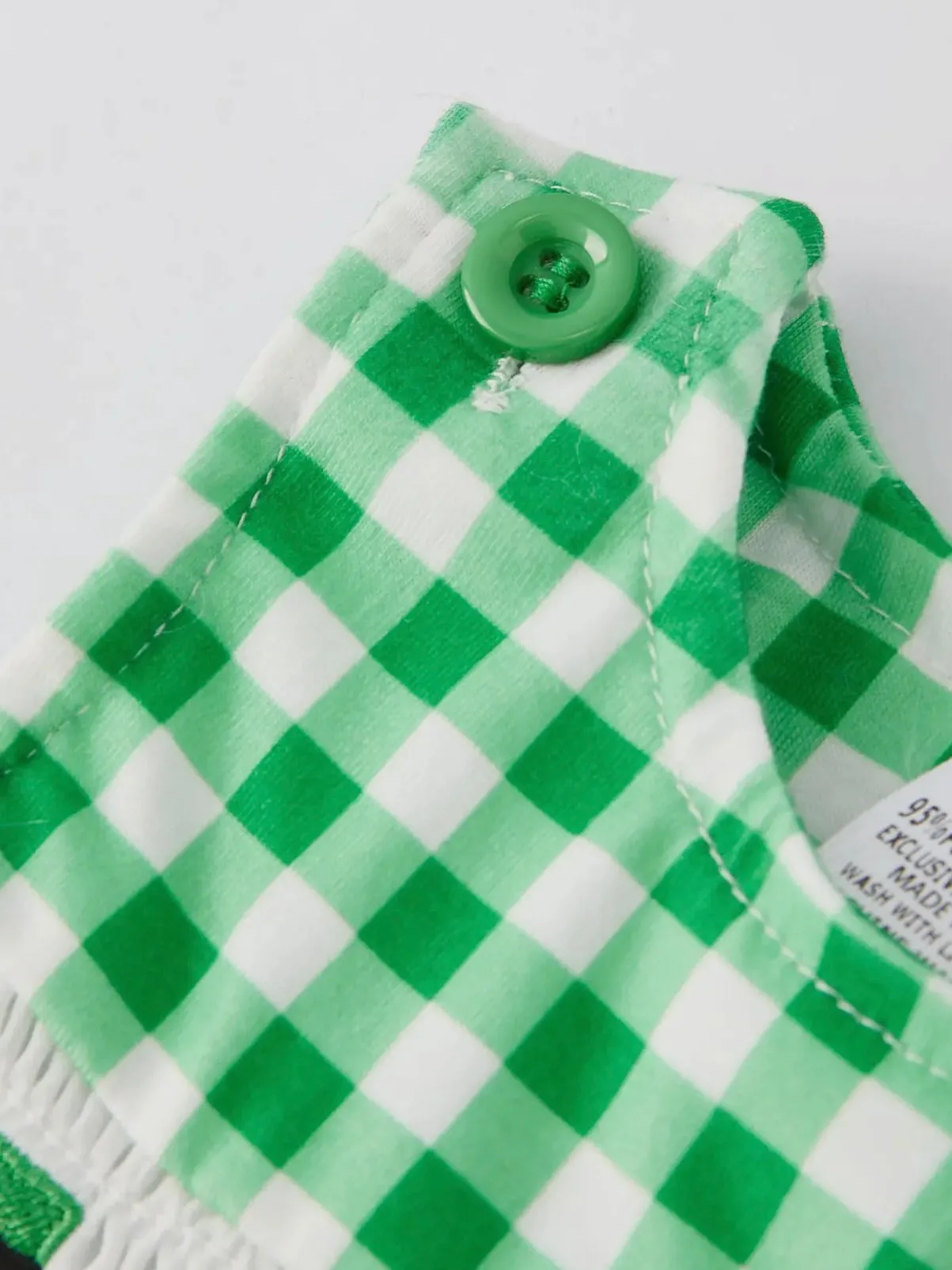 Lucky Charm Boys Smocked Romper: Green Mix